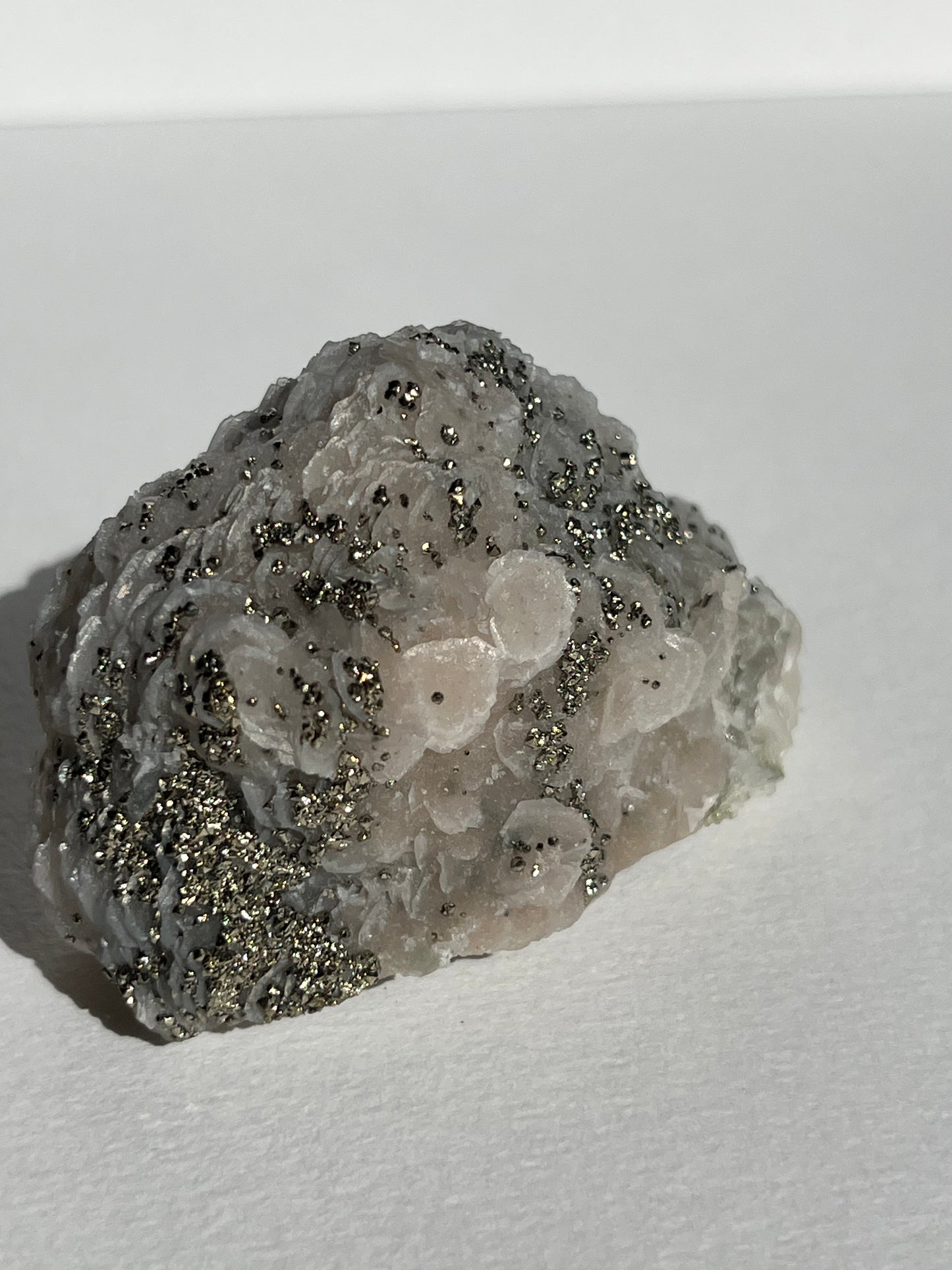 Pyrite Dusted Pink Coin Calcite Specimen (UV Reactive)