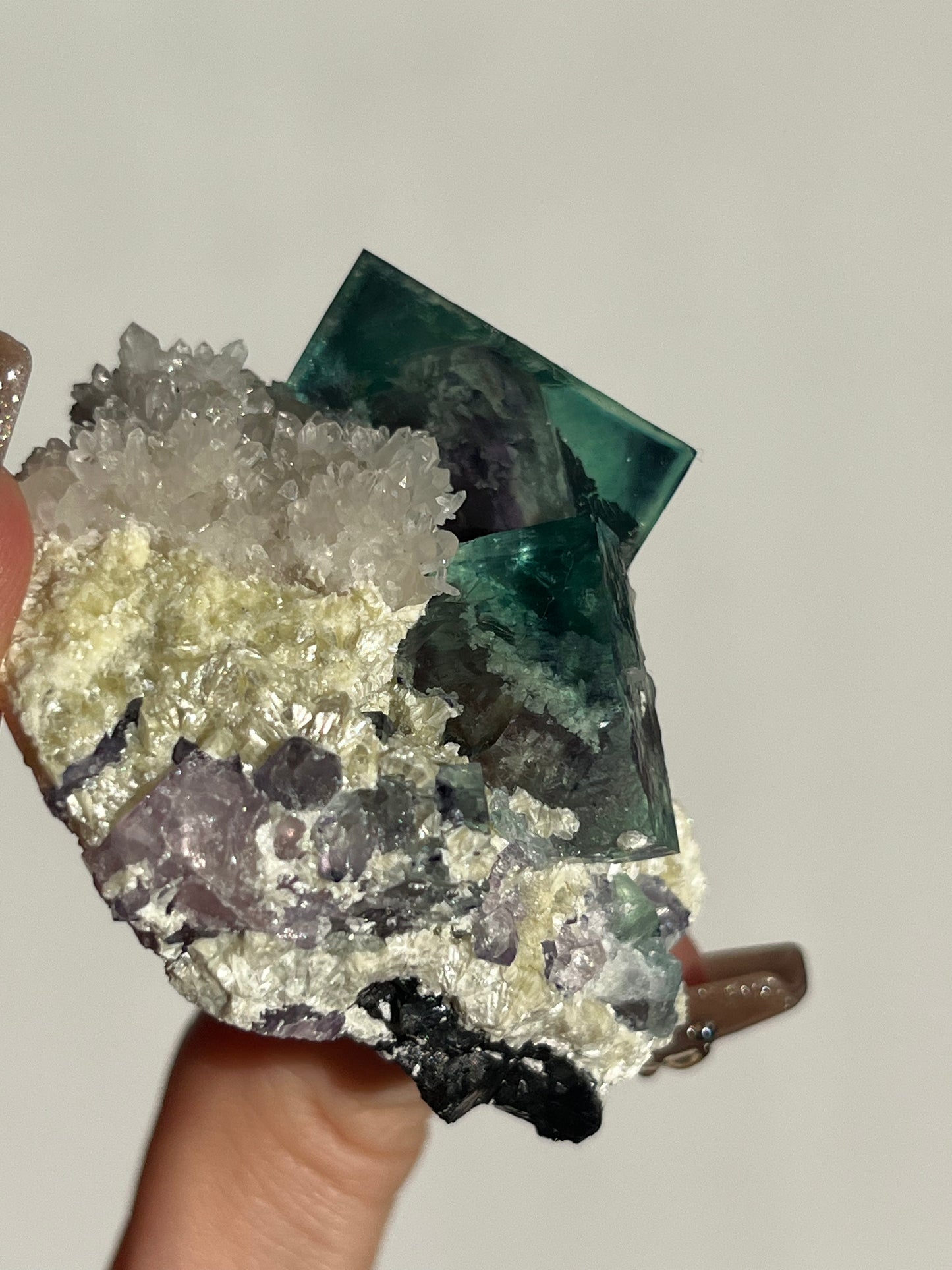 Vibrant Green-Purple Phantom Yindu Fluorite Specimen with Quartz E