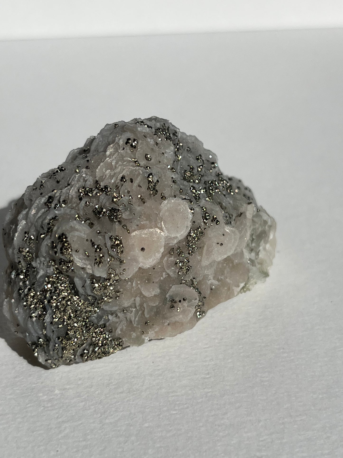Pyrite Dusted Pink Coin Calcite Specimen (UV Reactive)