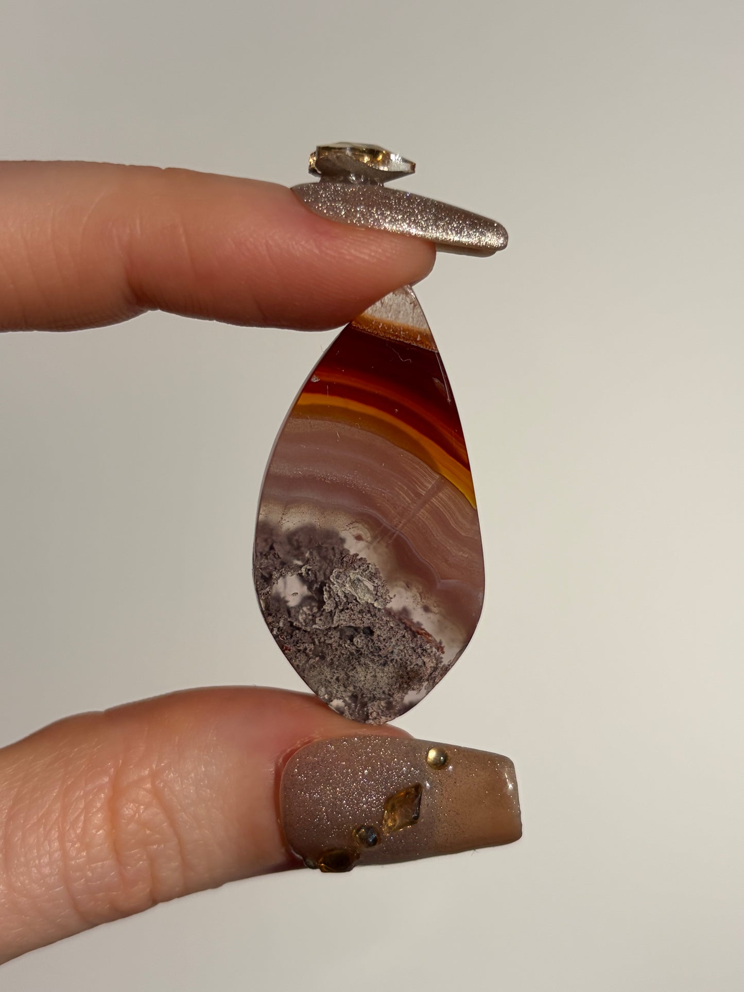 Red and Pink Laguna Agate Cabochon with Purple Moss Inclusions and Parallax Effect B