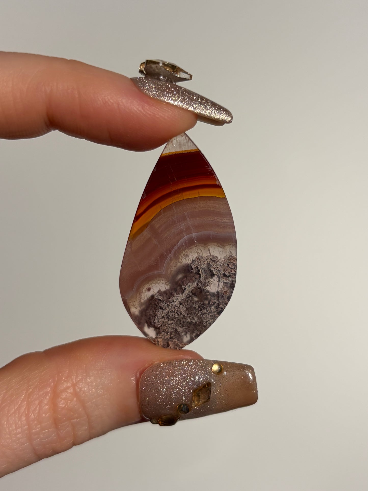 Red and Pink Laguna Agate Cabochon with Purple Moss Inclusions and Parallax Effect B